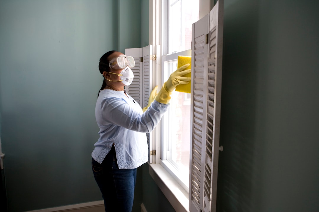 Employee cleaning property